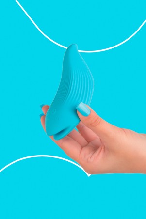 Fairygasm DelightfulWave vibrator blue held in hand, showing texture and ergonomics
