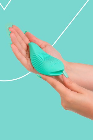 Fairygasm DelightfulWave vibrator green held in hand, showing lines and texture
