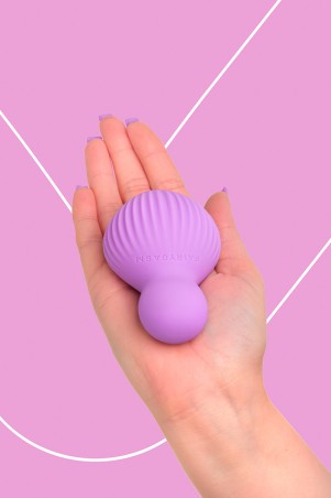 Fairygasm EnchantedDesire vibrator purple held in hand, highlighting texture