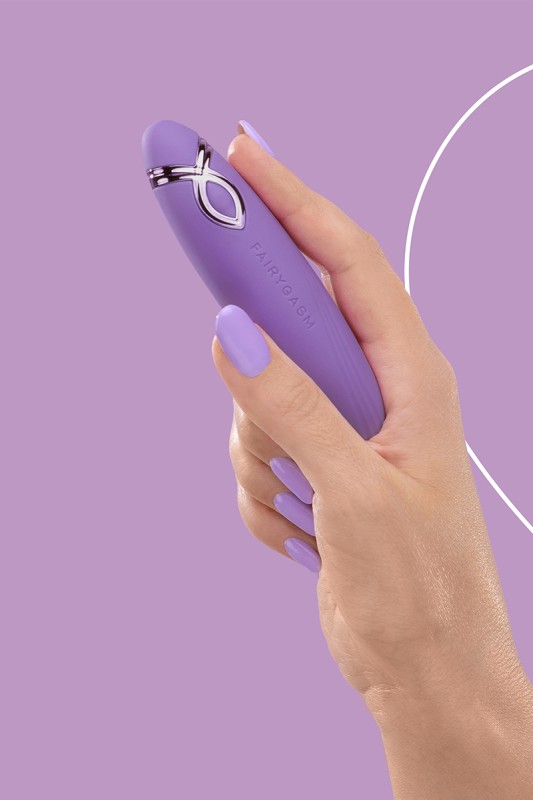 Fairygasm PleasureArrow purple held in hand