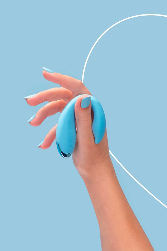 Fairygasm PleasureBerry blue held in hand