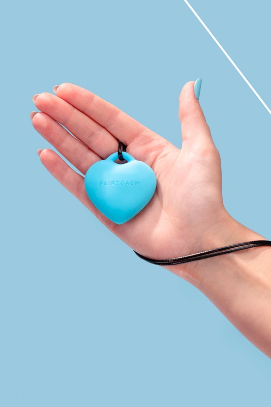 Fairygasm PleasureStone blue held in hand