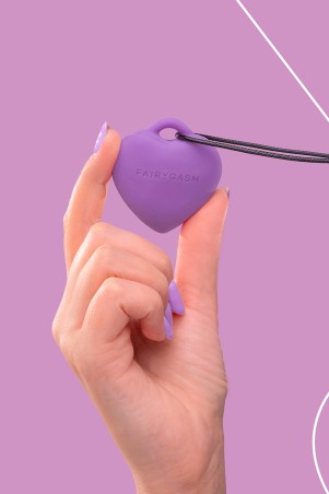 Fairygasm PleasureStone purple held in hand