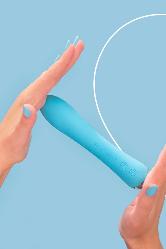 Fairygasm WowGenie blue held in hand