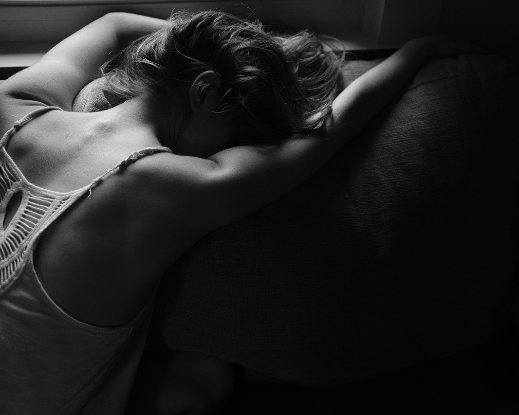 Silhouette of a woman reflecting on her body after breast cancer treatment